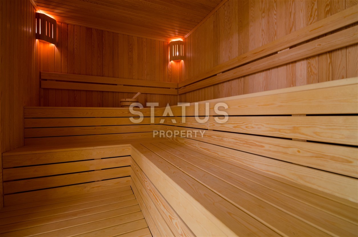 Недвижимость в Алании  у самого берега моря в популярном районе Махмутлар фото 10