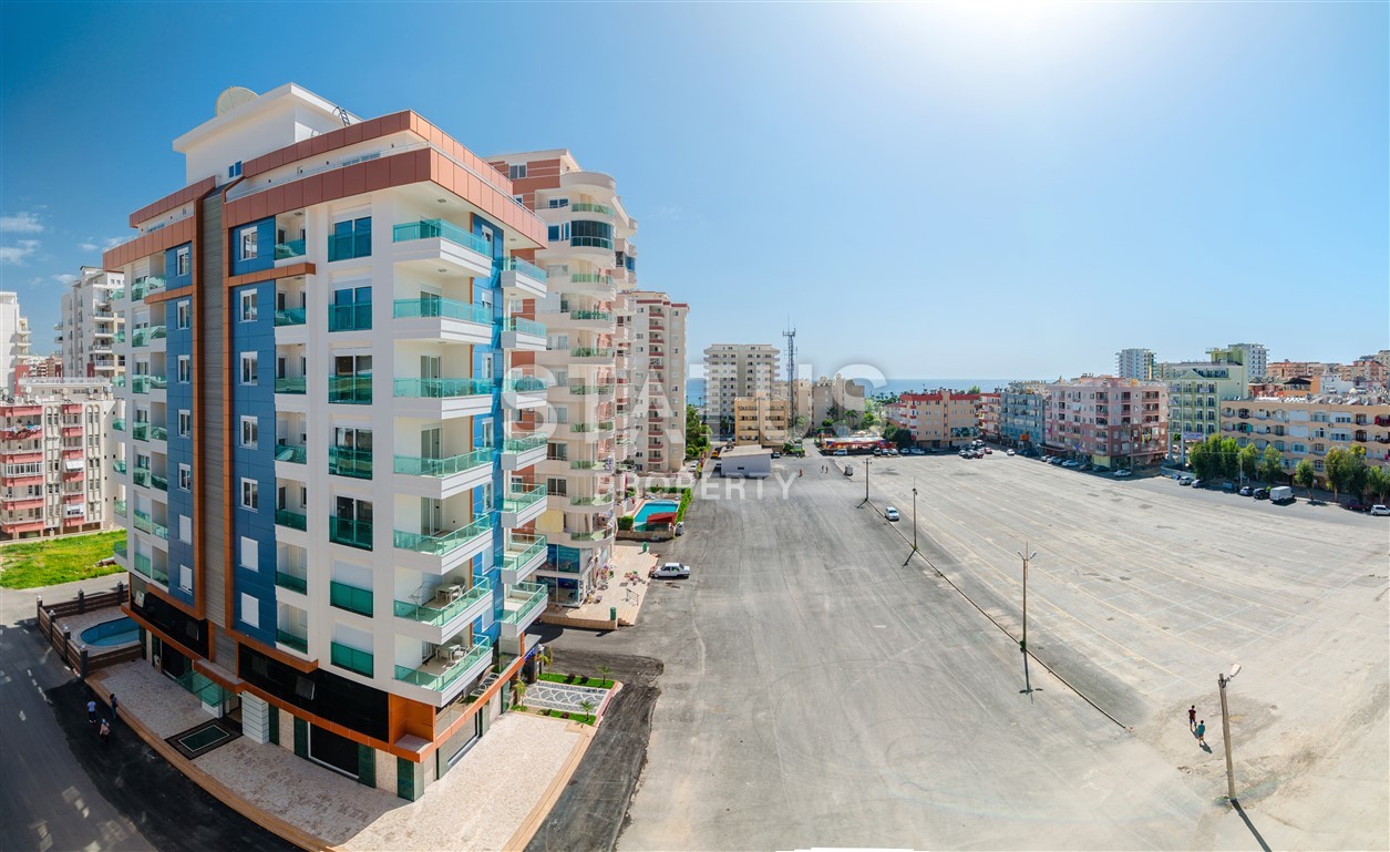 Недвижимость в Алании  у самого берега моря в популярном районе Махмутлар фото 11