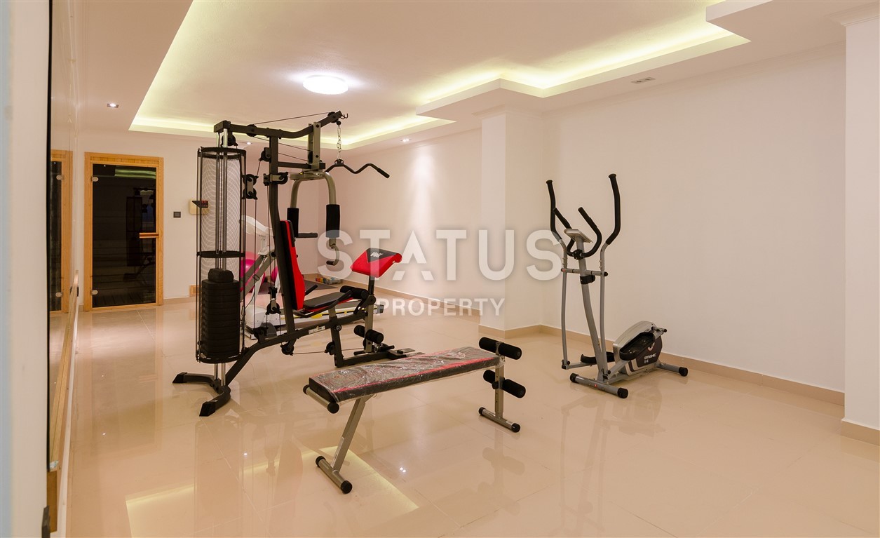 Недвижимость в Алании  у самого берега моря в популярном районе Махмутлар фото 12