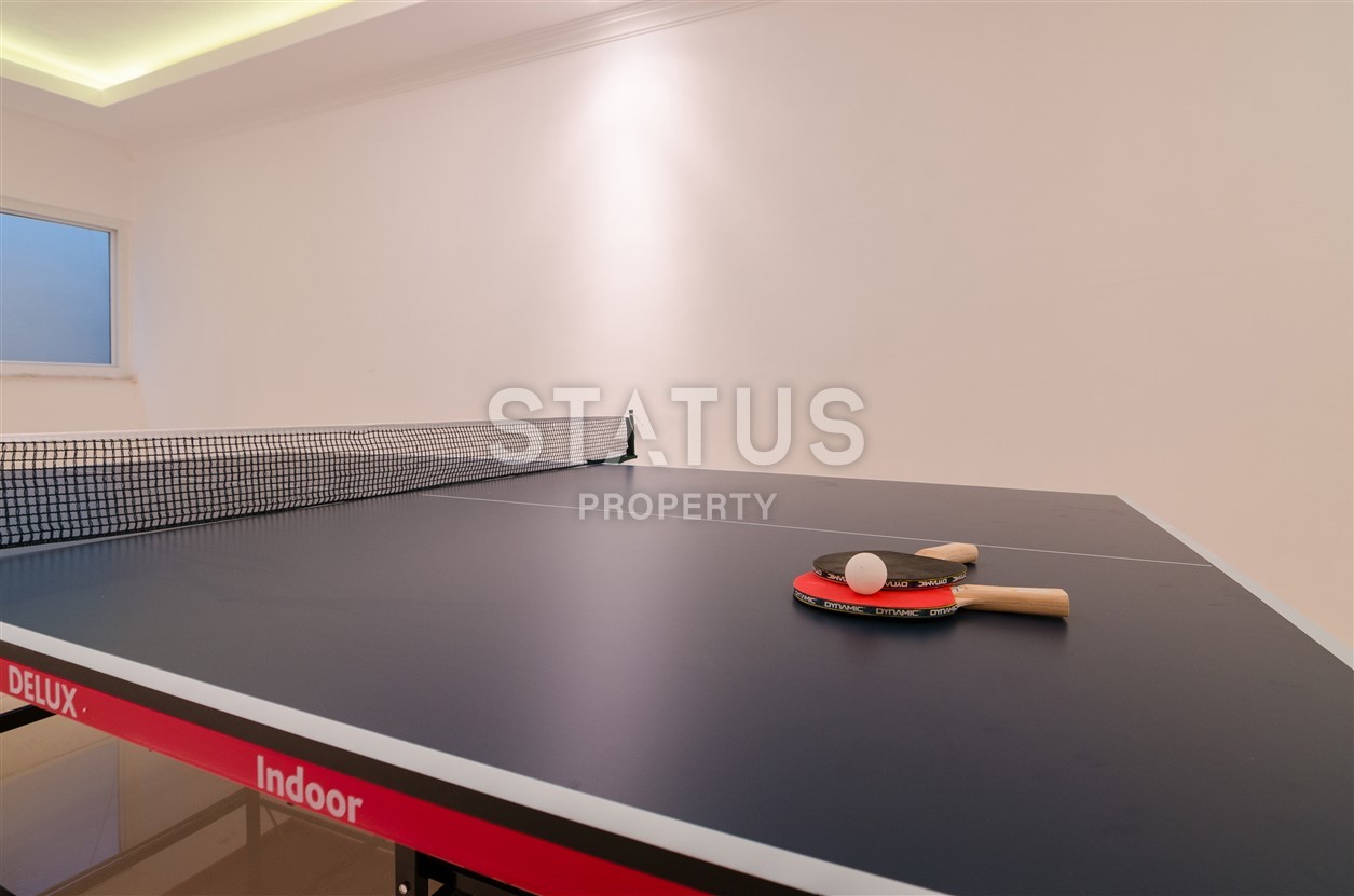 Недвижимость в Алании  у самого берега моря в популярном районе Махмутлар фото 14