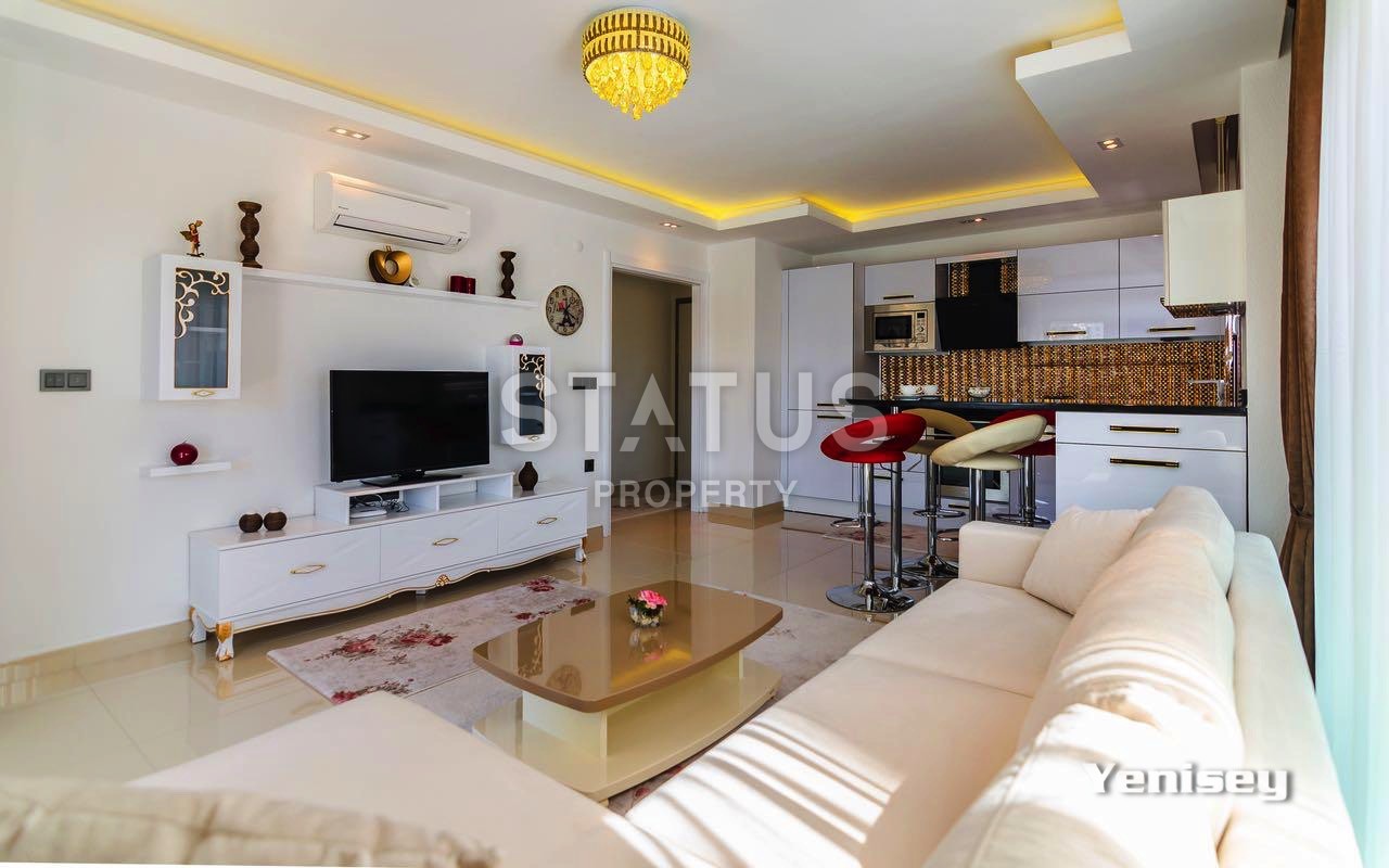 Недвижимость в Алании  у самого берега моря в популярном районе Махмутлар фото 15