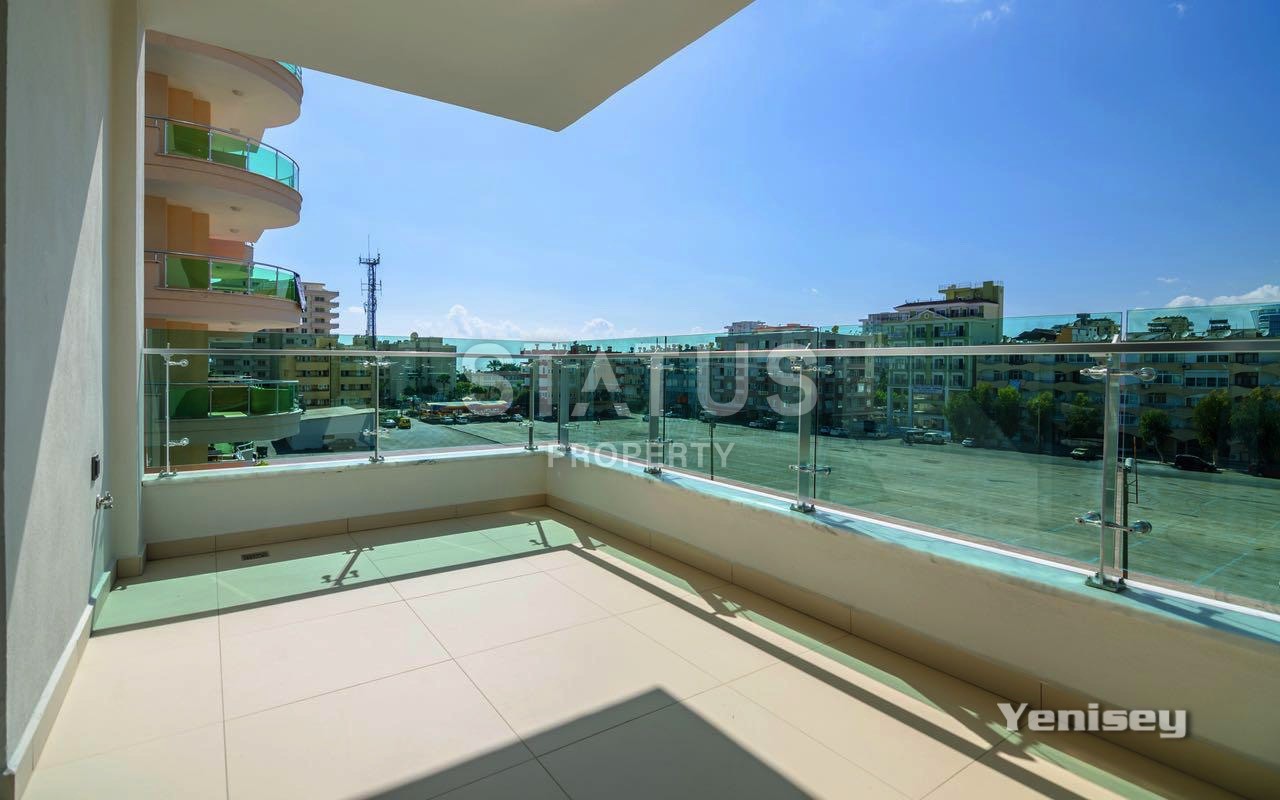 Недвижимость в Алании  у самого берега моря в популярном районе Махмутлар фото 16