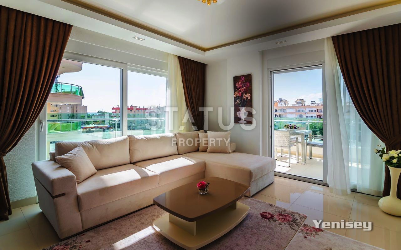 Недвижимость в Алании  у самого берега моря в популярном районе Махмутлар фото 18