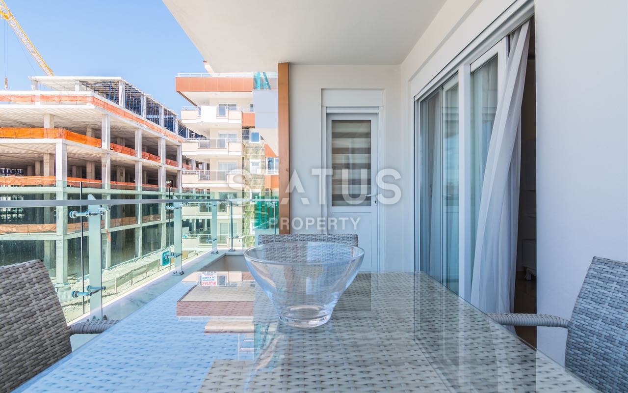 Недвижимость в Алании  у самого берега моря в популярном районе Махмутлар фото 20