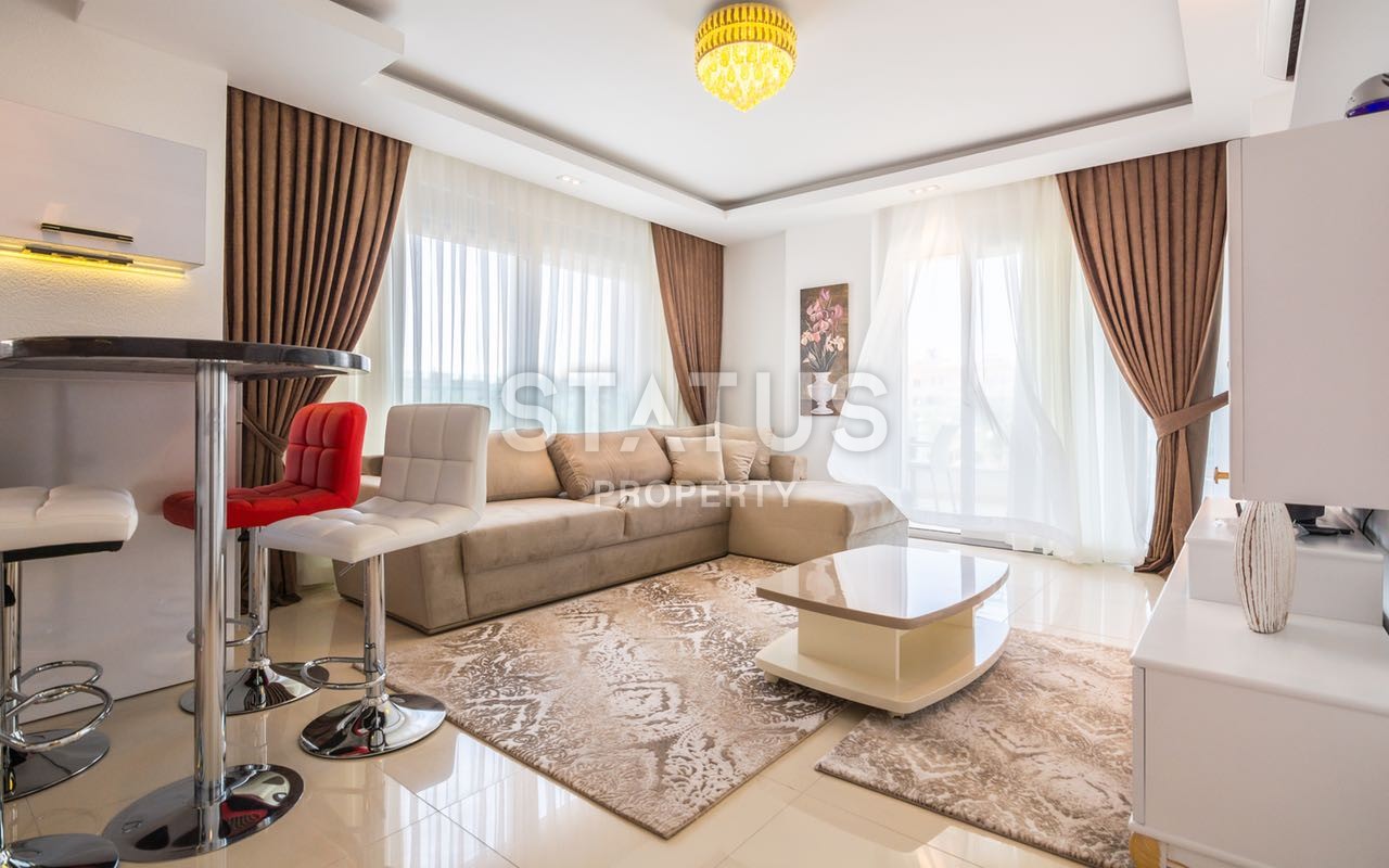 Недвижимость в Алании  у самого берега моря в популярном районе Махмутлар фото 21