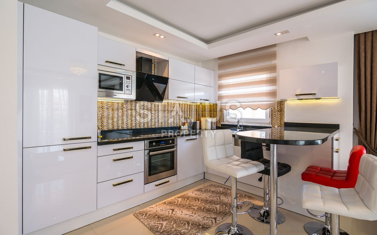 Недвижимость в Алании  у самого берега моря в популярном районе Махмутлар фото 22