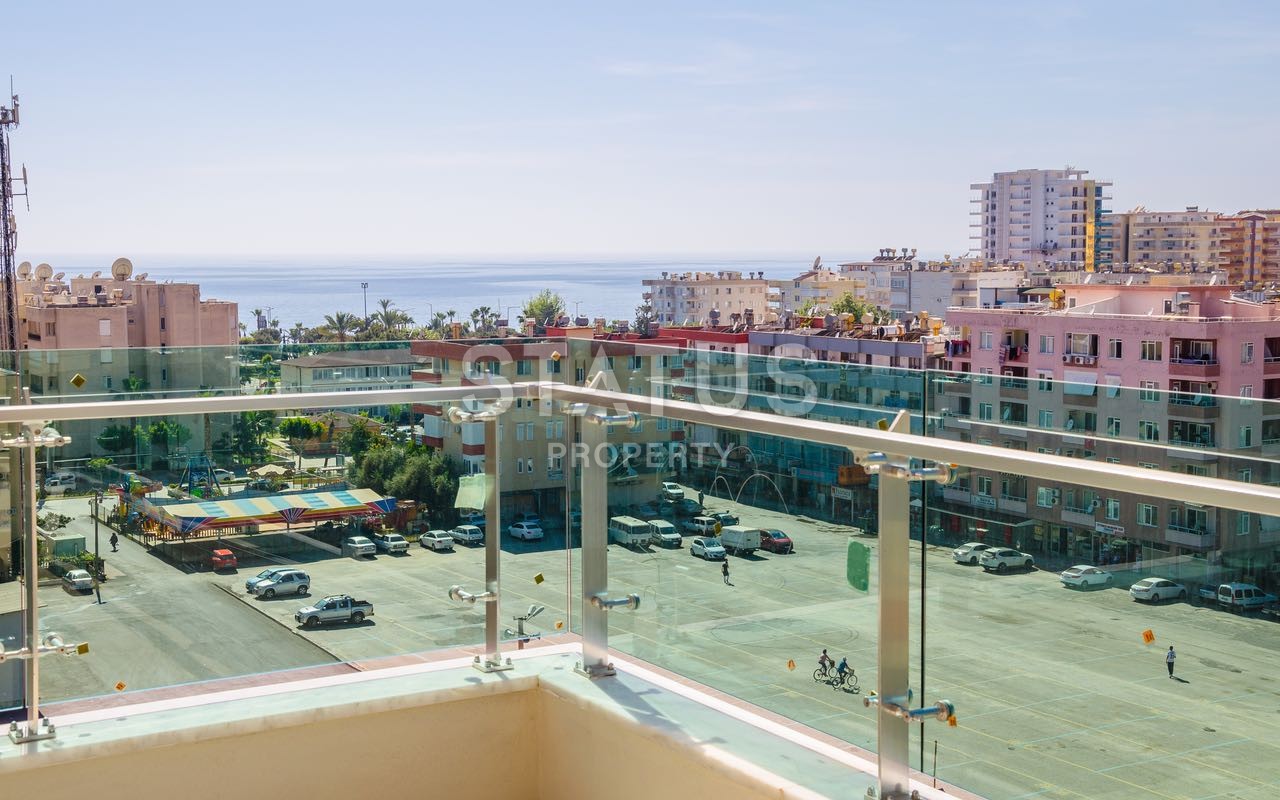 Недвижимость в Алании  у самого берега моря в популярном районе Махмутлар фото 24