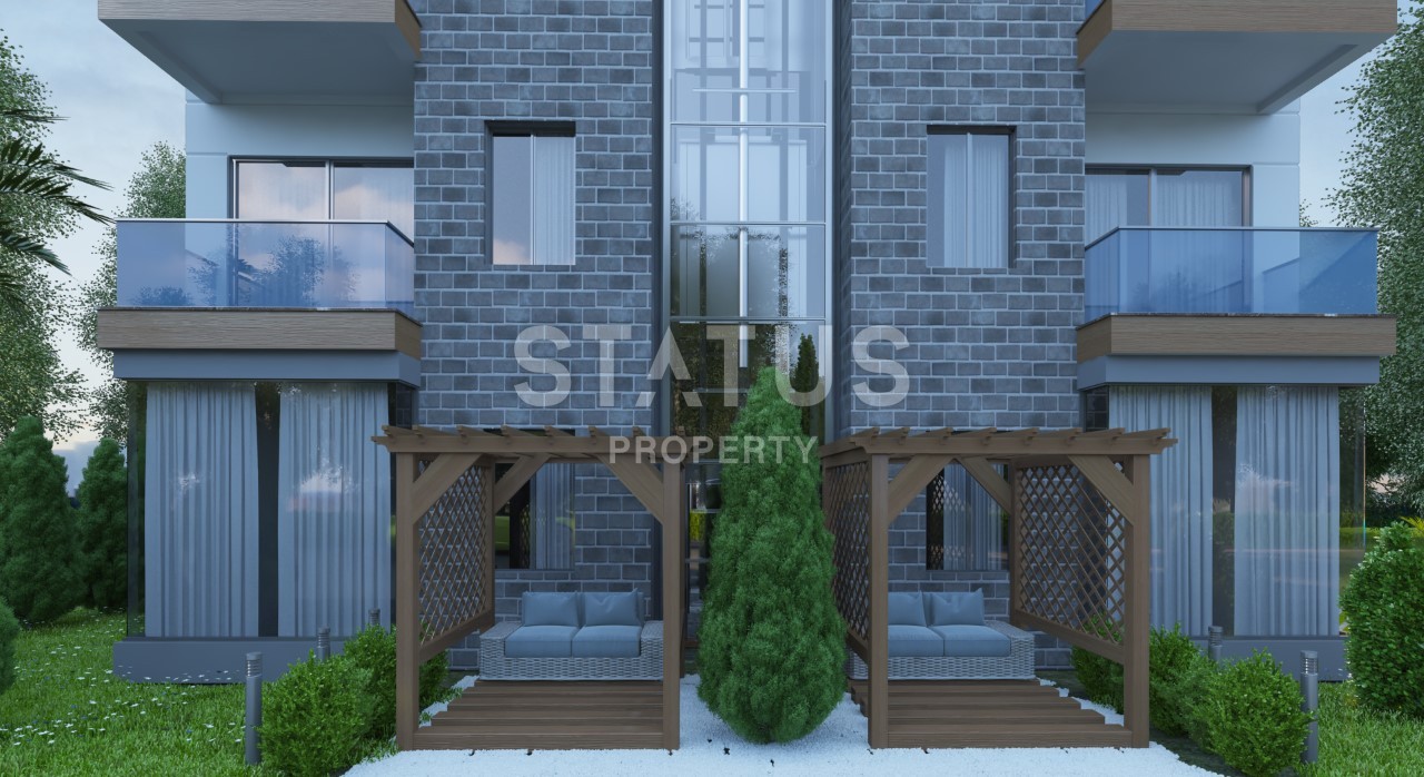 Новый инвестиционный проект в районе Кестель, в 5 минутах от моря! 52- 107 м2 фото 6