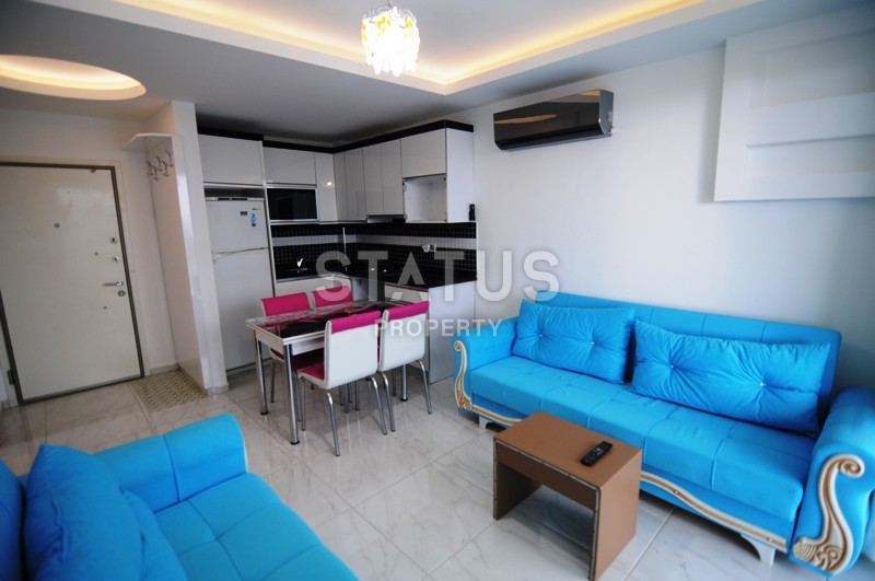 Двухкомнатная квартира в отличном комплексе в Махмутларе, 55 м2 фото 3