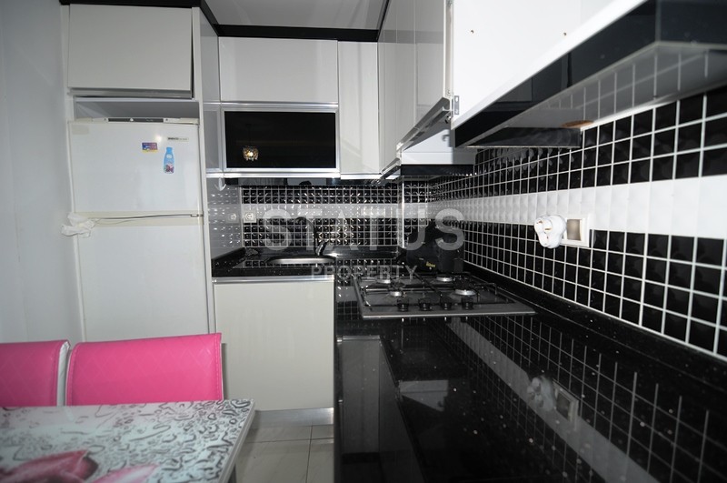 Двухкомнатная квартира в отличном комплексе в Махмутларе, 55 м2 фото 7