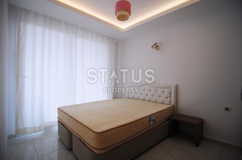 Двухкомнатная квартира в отличном комплексе в Махмутларе, 55 м2 фото 9