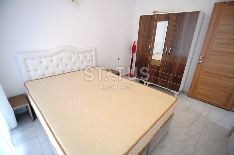 Двухкомнатная квартира в отличном комплексе в Махмутларе, 55 м2 фото 10