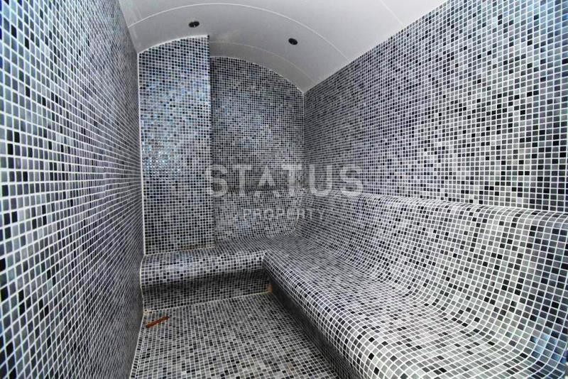 Двухкомнатная квартира в отличном комплексе в Махмутларе, 55 м2 фото 18