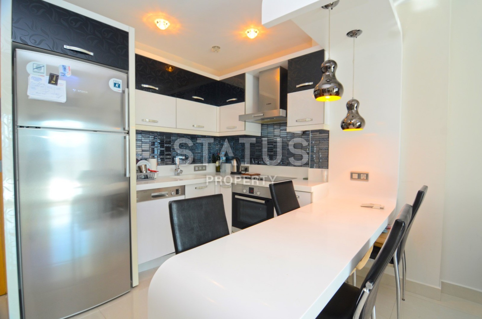 Уютная двухкомнатная квартира в элитном комплексе в Махмутларе, 70 м2 фото 5