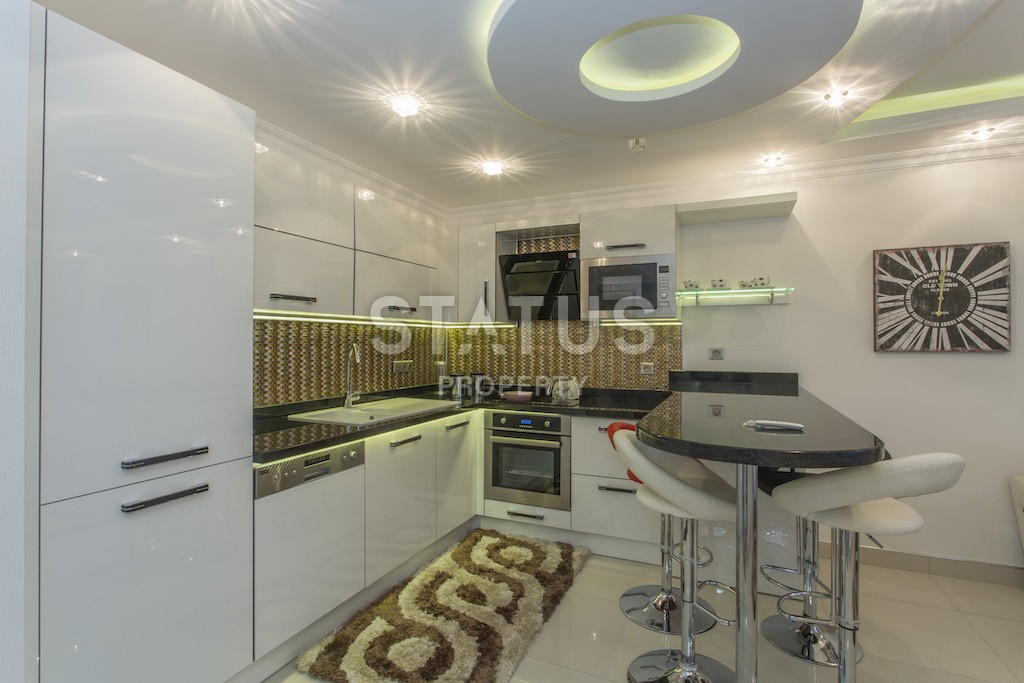 Апартаменты люкс- класса в 100 метрах от моря  в центре района Махмутлар фото 14