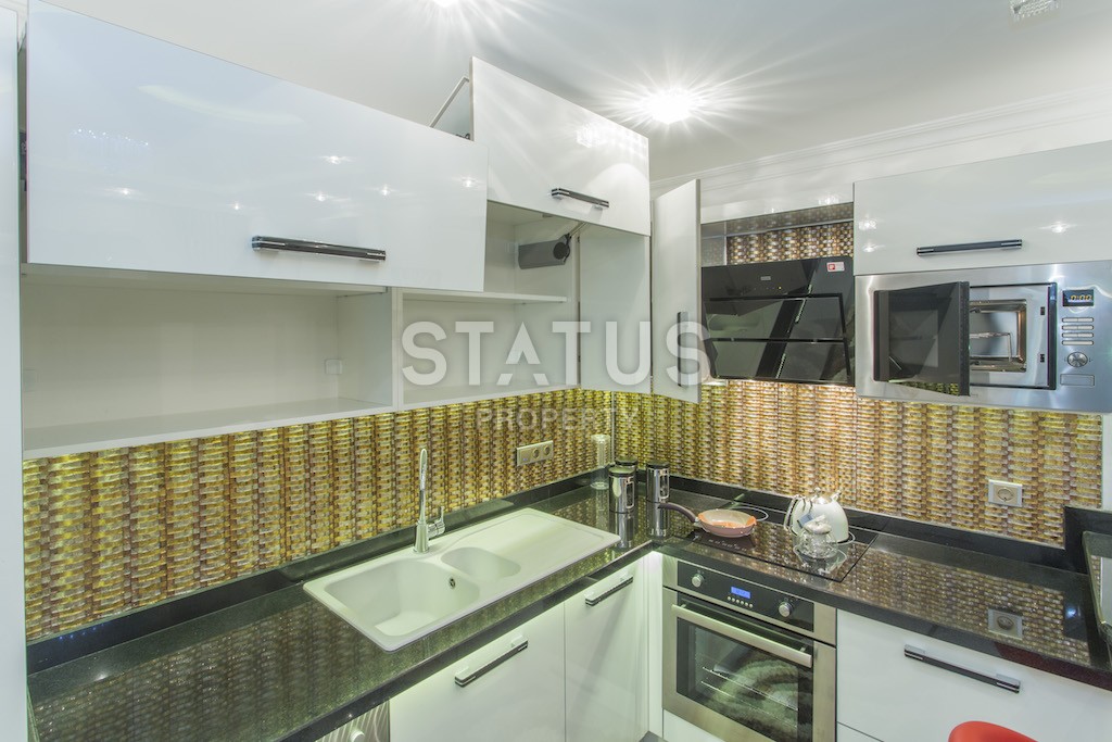 Апартаменты люкс- класса в 100 метрах от моря  в центре района Махмутлар фото 17