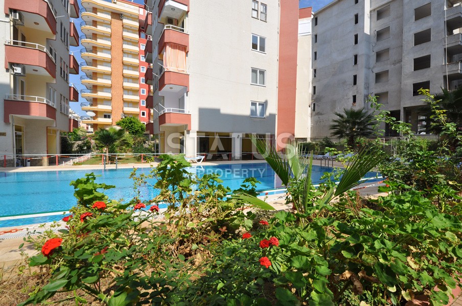 Недорогая двухкомнатная квартира в 250 метрах от побережья Махмутлара, 55 м2 фото 1