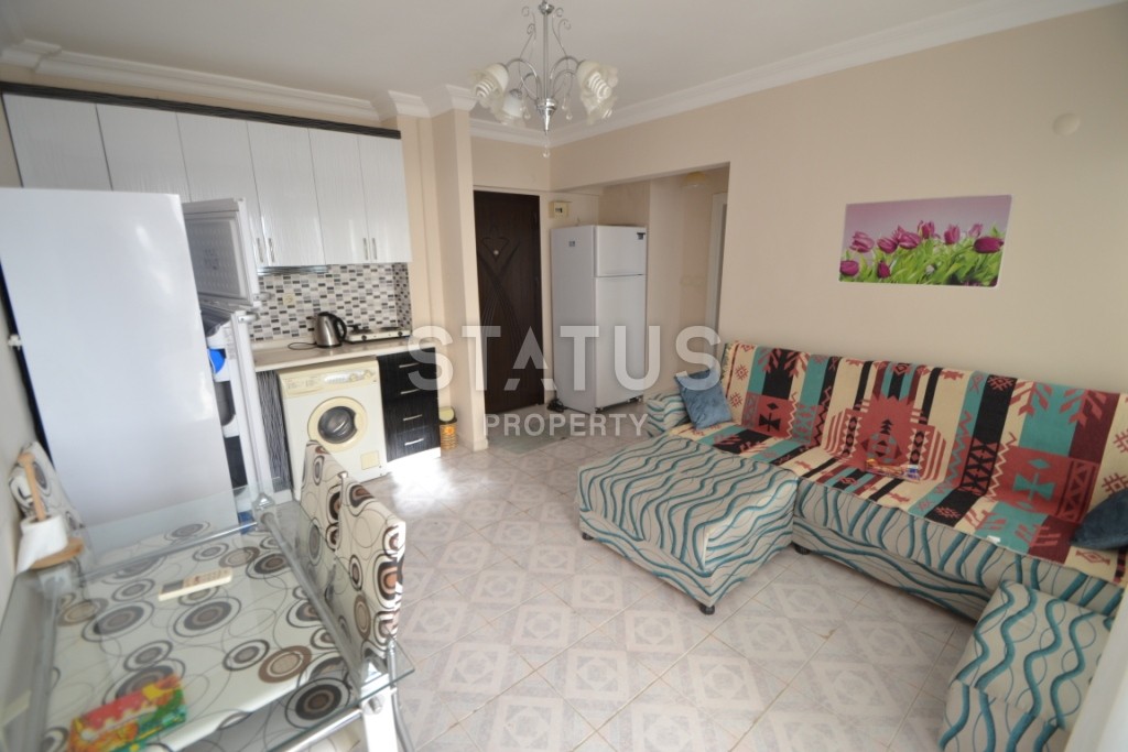 Недорогая двухкомнатная квартира в 250 метрах от побережья Махмутлара, 55 м2 фото 8