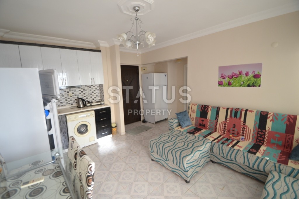 Недорогая двухкомнатная квартира в 250 метрах от побережья Махмутлара, 55 м2 фото 9