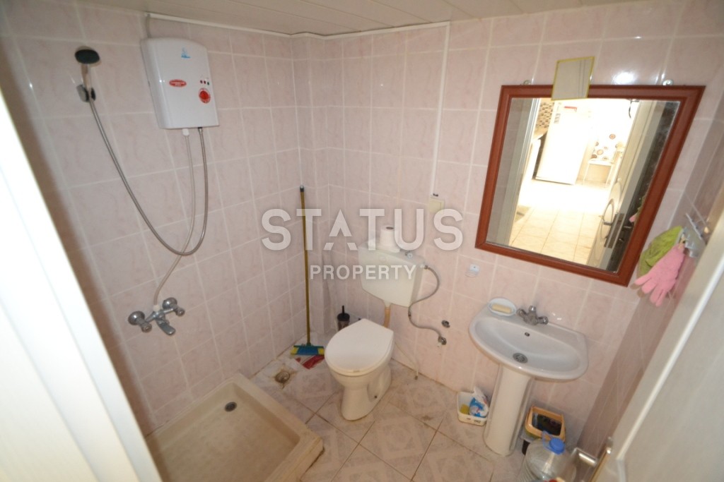 Недорогая двухкомнатная квартира в 250 метрах от побережья Махмутлара, 55 м2 фото 11