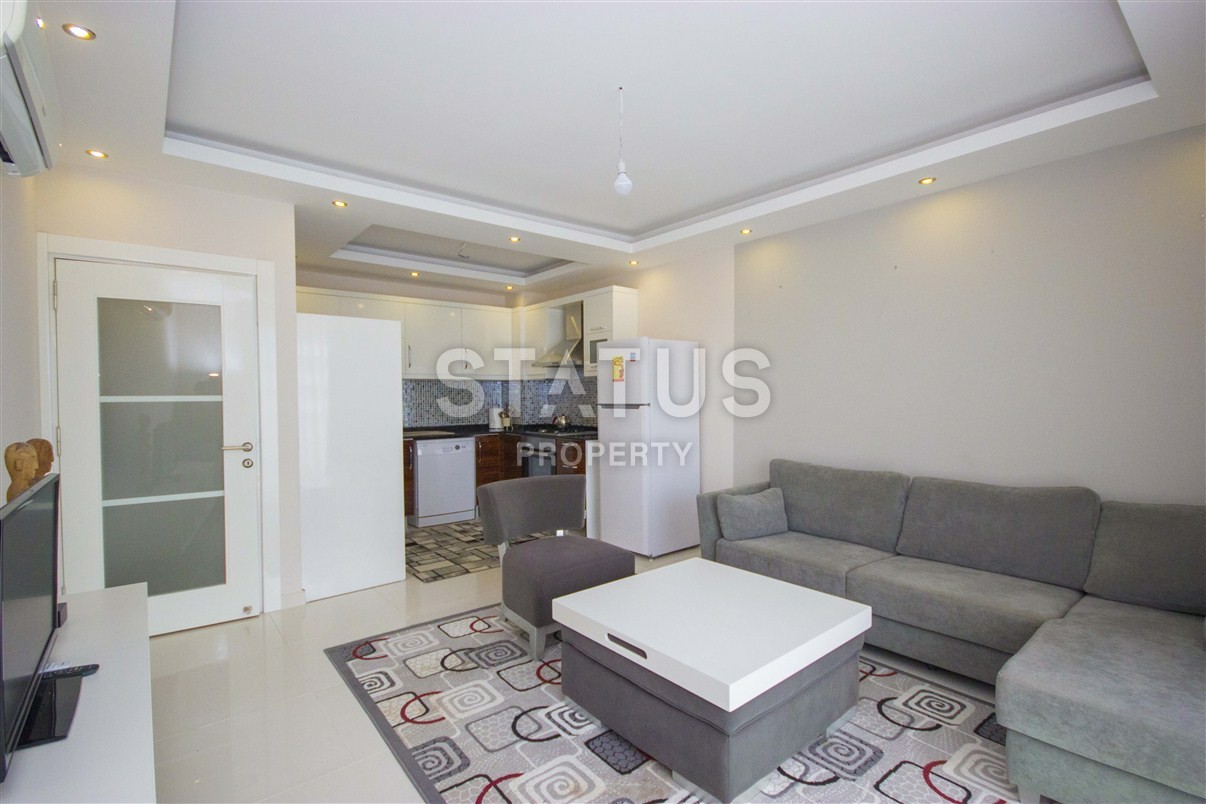 Квартира в комплексе с крытым бассейном в Махмутларе 70 кв.м. фото 8