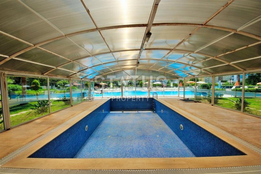 Квартира в комплексе с крытым бассейном в Махмутларе 70 кв.м. фото 11