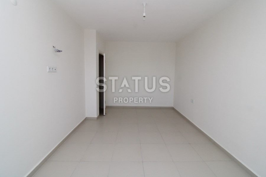 Апартаменты в Махмутларе планировки 2+1 в комплексе с бассейном фото 3