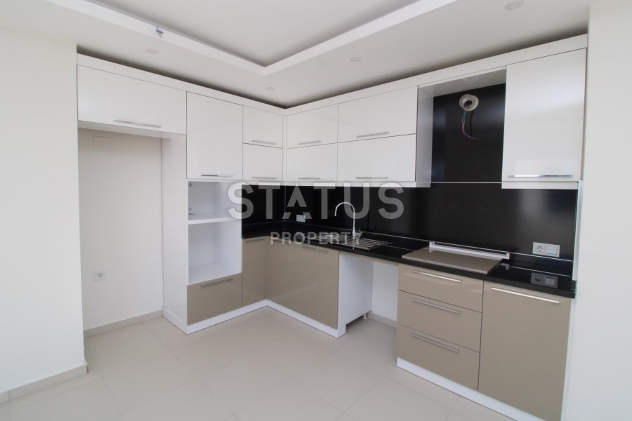 Апартаменты в Махмутларе планировки 2+1 в комплексе с бассейном фото 17