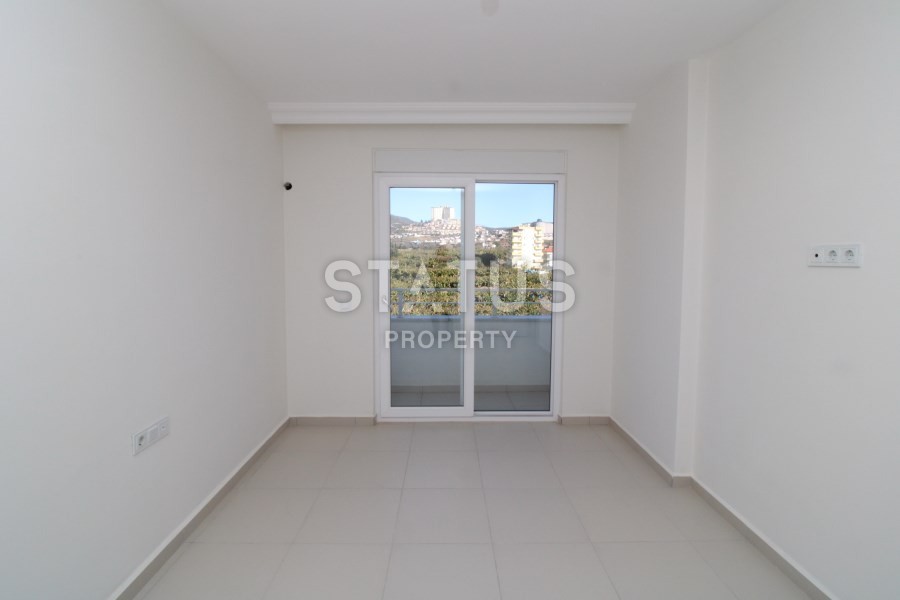 Апартаменты в Махмутларе планировки 2+1 в комплексе с бассейном фото 22