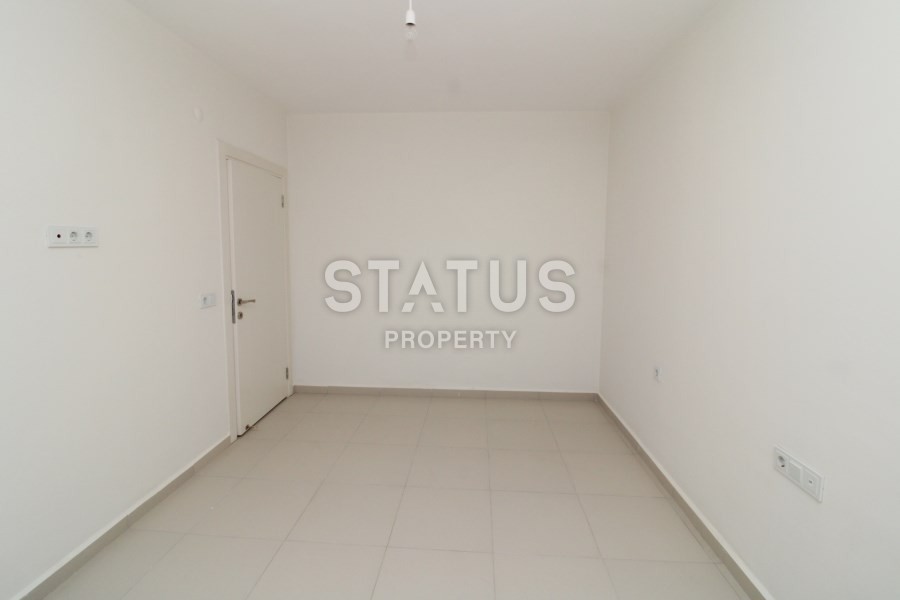 Апартаменты в Махмутларе планировки 2+1 в комплексе с бассейном фото 23