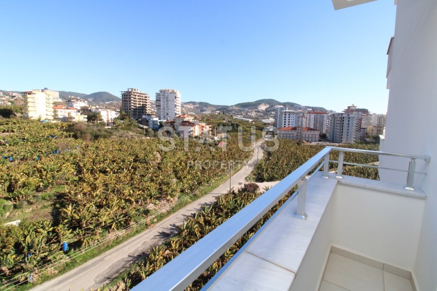 Апартаменты в Махмутларе планировки 2+1 в комплексе с бассейном фото 24