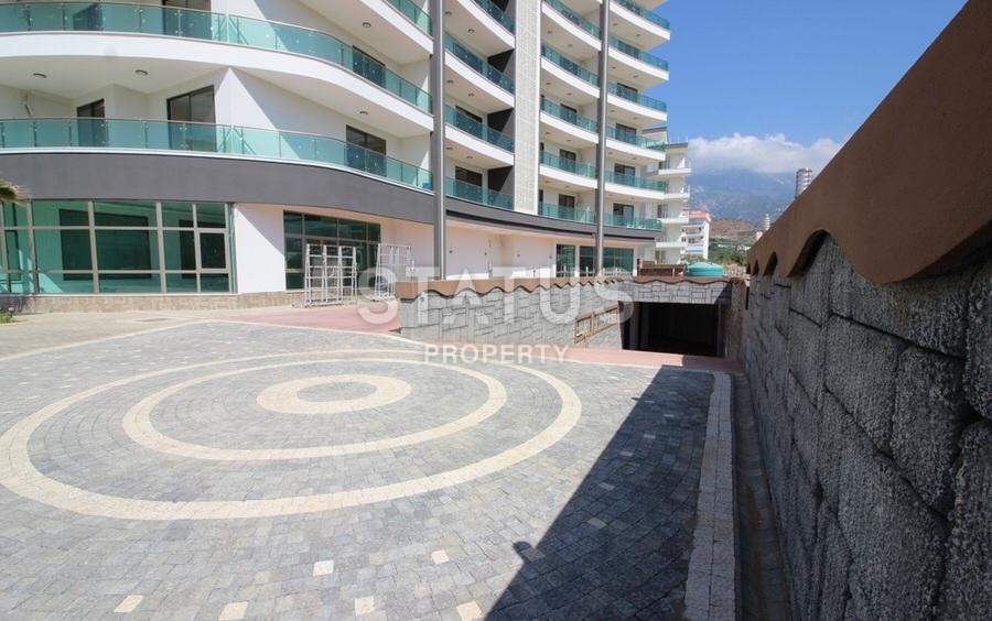 Уютная двухкомнатная квартира в элитном комплексе в районе Махмутлар, 70 м2 фото 14