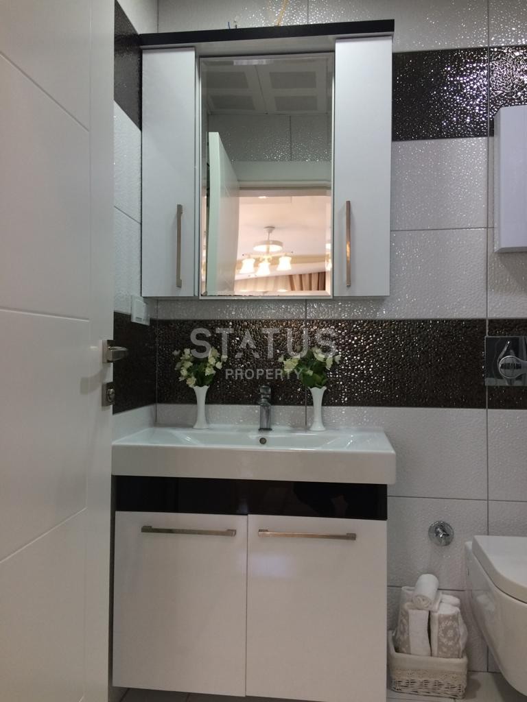 Меблированная двухкомнатная квартира в Махмутларе, площадь  65 м2 фото 18