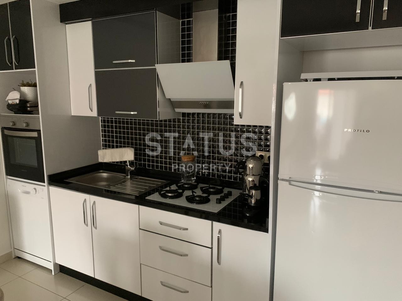 Двухкомнатная квартира с хорошей мебелью и техникой в Махмутларе, 65 м2 фото 4