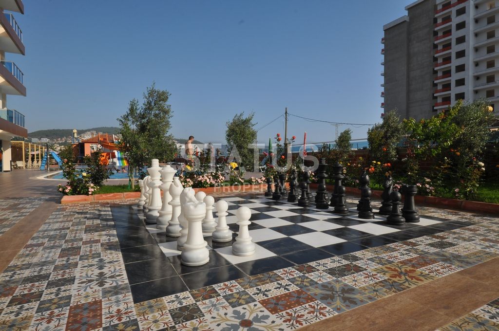 Двухкомнатная квартира с хорошей мебелью и техникой в Махмутларе, 65 м2 фото 26