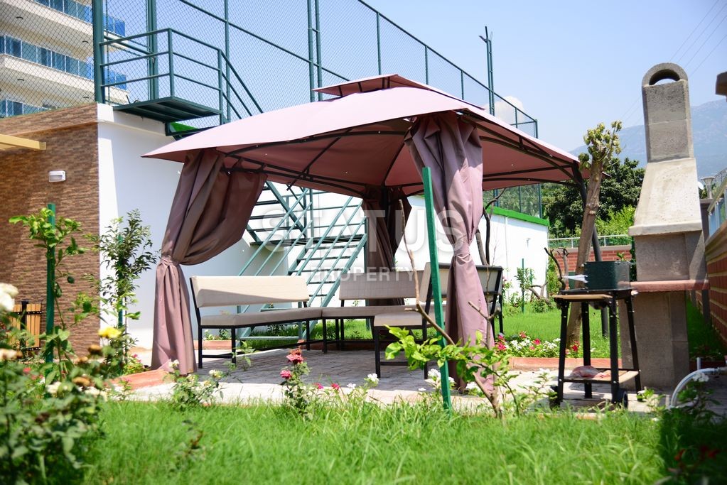 Двухкомнатная квартира с хорошей мебелью и техникой в Махмутларе, 65 м2 фото 28