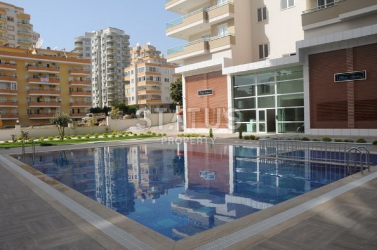 Новая двухкомнатная квартира с мебелью в Махмутларе, 65 м2 фото 1