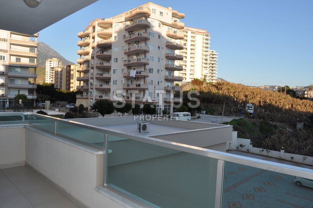 Новая двухкомнатная квартира с мебелью в Махмутларе, 65 м2 фото 20