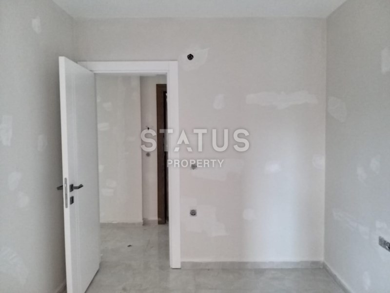 Комплекс на первой береговой линии в районе Махмутлар 90 кв.м. фото 3