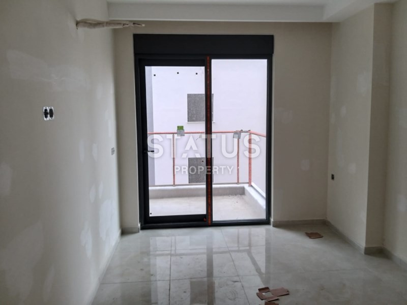 Комплекс на первой береговой линии в районе Махмутлар 90 кв.м. фото 4