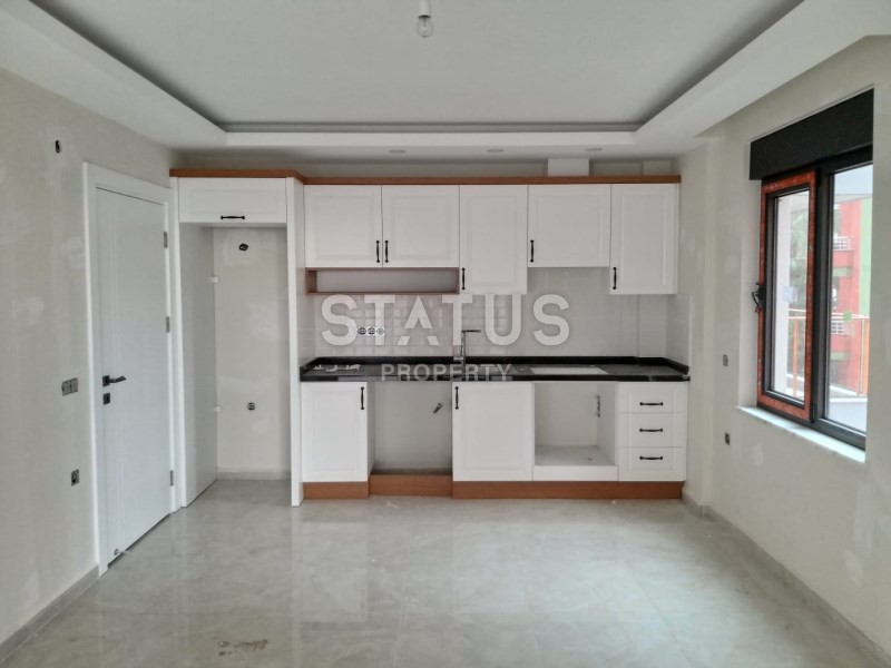 Комплекс на первой береговой линии в районе Махмутлар 90 кв.м. фото 8