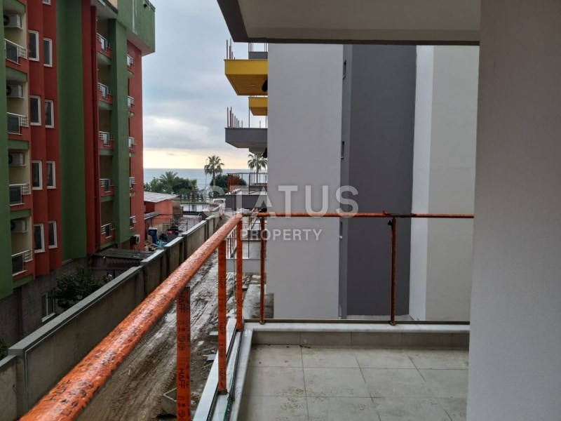 Комплекс на первой береговой линии в районе Махмутлар 90 кв.м. фото 9