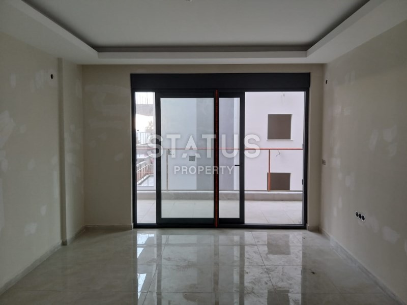 Комплекс на первой береговой линии в районе Махмутлар 90 кв.м. фото 11