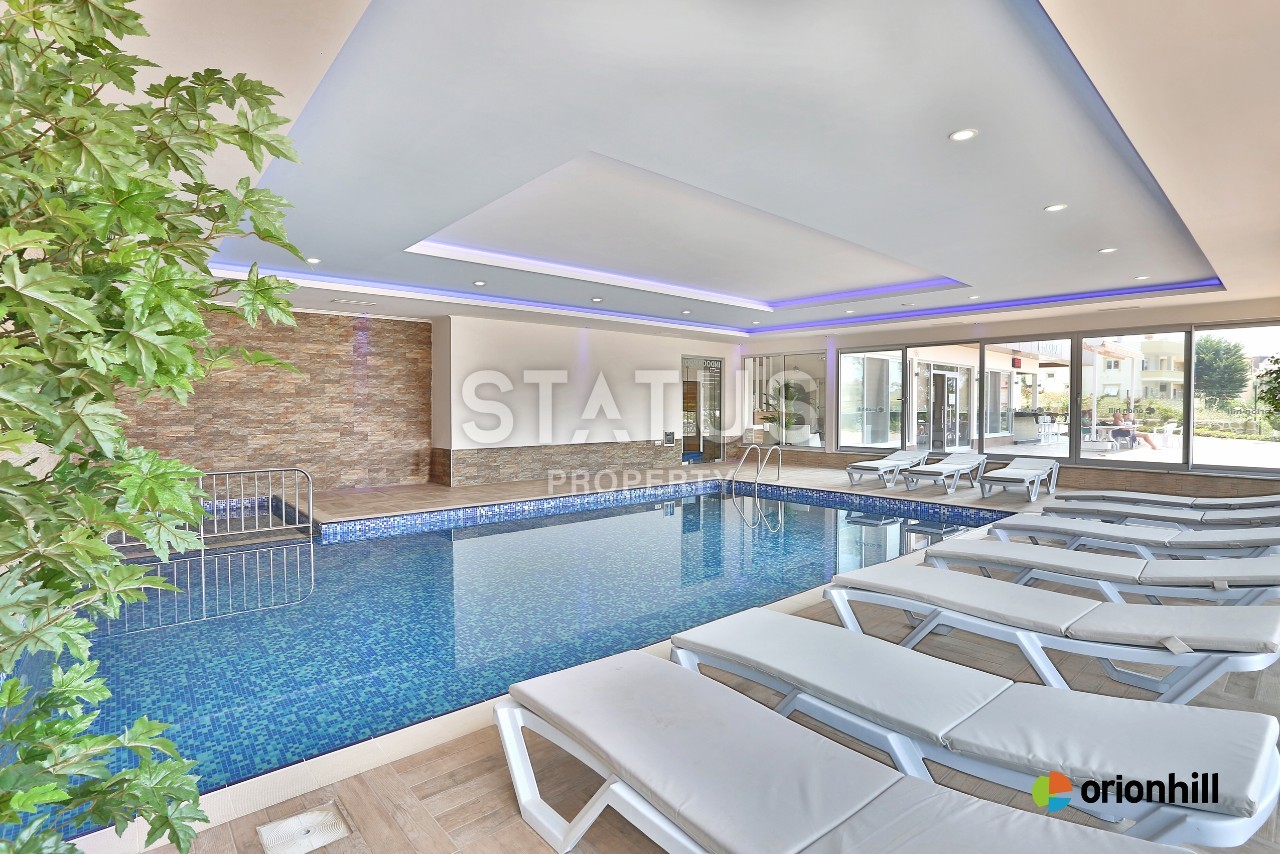 Трехкомнатные апартаменты по выгодной стоимости в спокойном районе Авсаллар фото 19