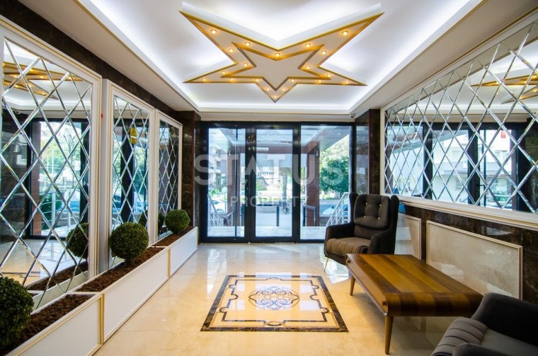 Новый современный проект в районе Махмутлар с большими квартирами фото 1