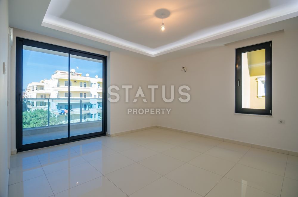 Новый современный проект в районе Махмутлар с большими квартирами фото 24