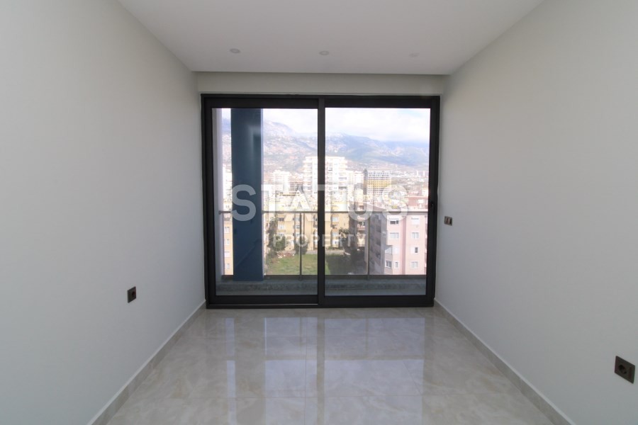 Апартаменты 2+1 на первой береговой линии с видом на горы и море в Махмутларе! 95 кв. м. фото 2