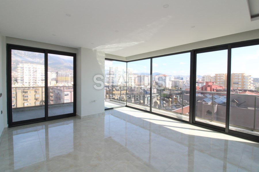 Апартаменты 2+1 на первой береговой линии с видом на горы и море в Махмутларе! 95 кв. м. фото 4