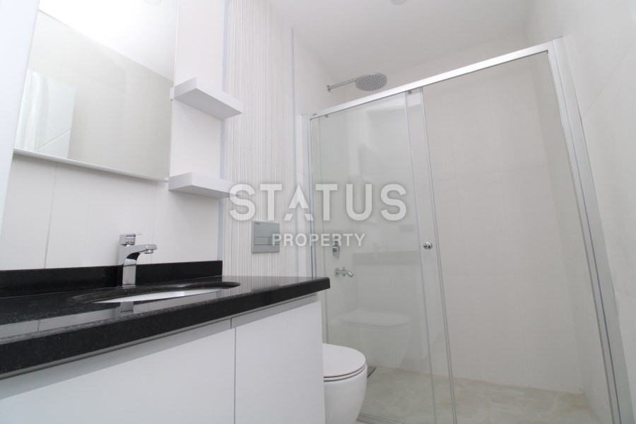 Апартаменты 2+1 на первой береговой линии с видом на горы и море в Махмутларе! 95 кв. м. фото 9