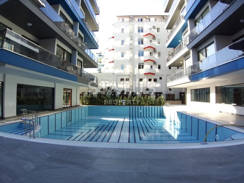 Апартаменты 2+1 на первой береговой линии с видом на горы и море в Махмутларе! 95 кв. м. фото 17